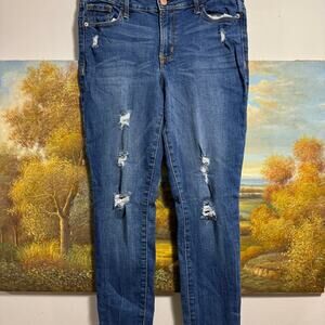 Old navy women’s 8 rockstar mid rise distressed jeans.